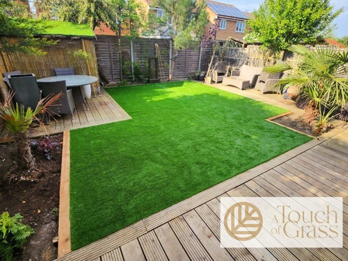 Artificial turf surrounded by decking